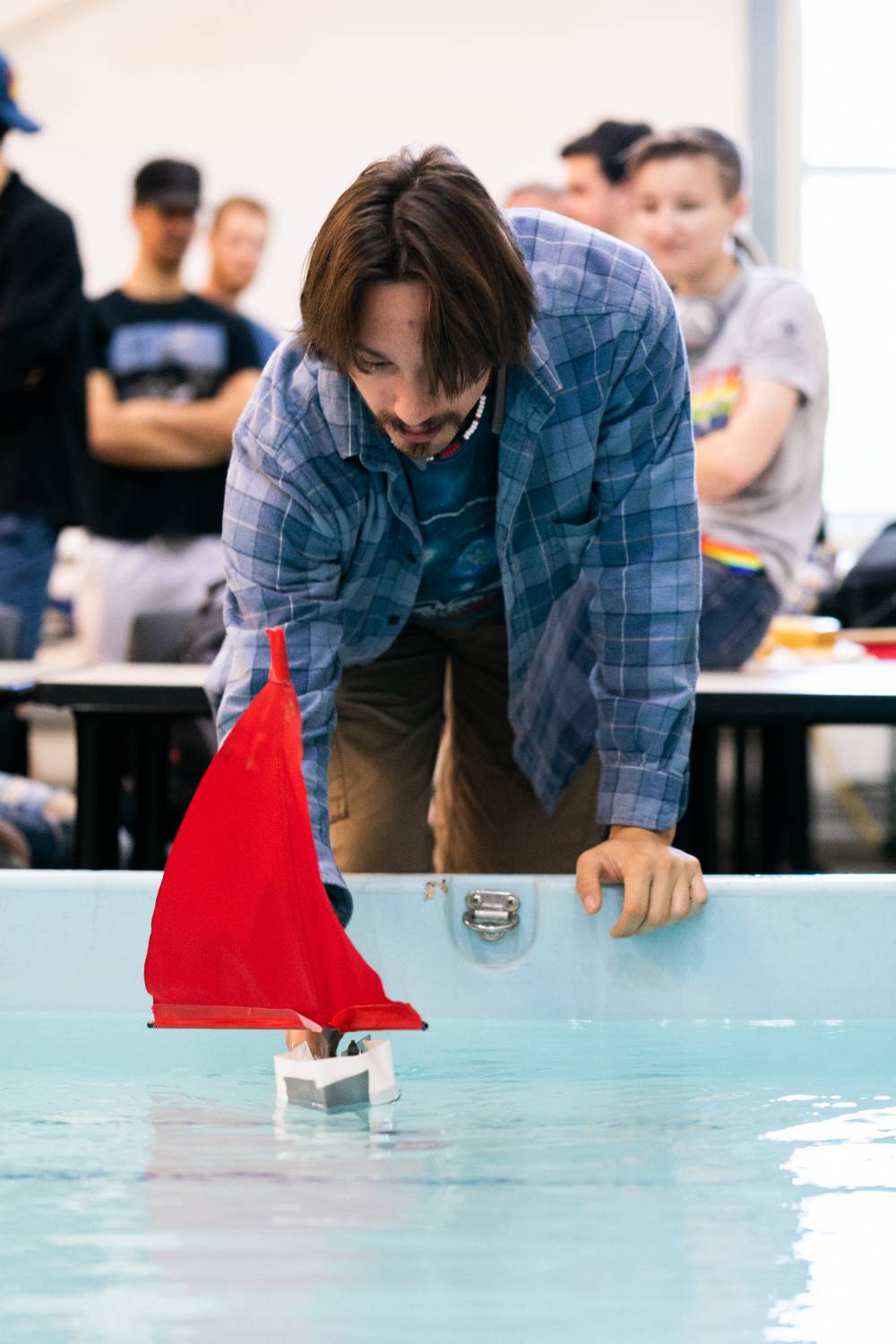 A student launches his boat